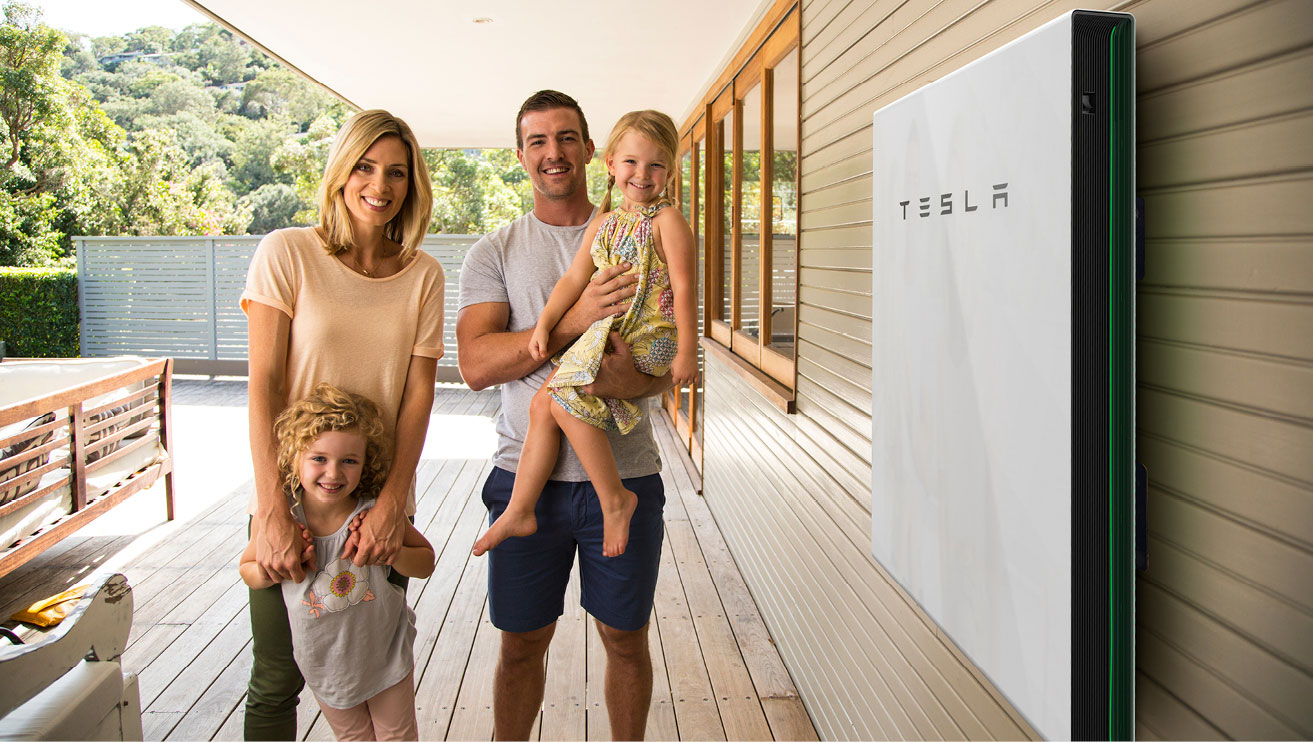Happy family with Tesla Powerwall 2